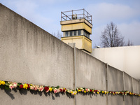 Flowers at Berlin Wall Memorial after the commemoration ceremony marking the 35th anniversary of the fall of the Berlin Wall. Berlin, German...