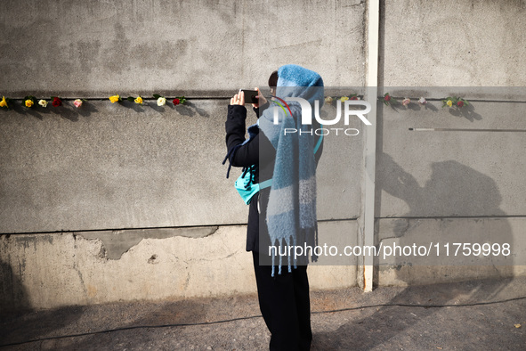 Flowers at Berlin Wall Memorial after the commemoration ceremony marking the 35th anniversary of the fall of the Berlin Wall. Berlin, German...