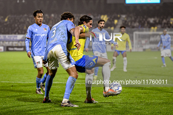 NEC defender Philippe Sandler and RKC forward Oskar Zawada play during the match RKC vs. NEC at the Mandemakers Stadium for the 2024-2025 se...