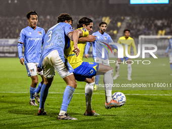 NEC defender Philippe Sandler and RKC forward Oskar Zawada play during the match RKC vs. NEC at the Mandemakers Stadium for the 2024-2025 se...