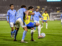 NEC defender Philippe Sandler and RKC forward Oskar Zawada play during the match RKC vs. NEC at the Mandemakers Stadium for the 2024-2025 se...