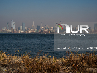 Smoke from New Jersey brush fires fills the sky in New York, U.S., on November 9, 2024. There are at least four active brush fires in New Je...