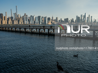 Smoke from New Jersey brush fires fills the sky in New York, U.S., on November 9, 2024. There are at least four active brush fires in New Je...