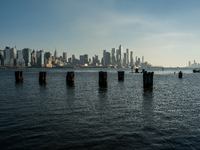 Smoke from New Jersey brush fires fills the sky in New York, U.S., on November 9, 2024. There are at least four active brush fires in New Je...