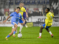 NEC forward Vito van Crooij and RKC forward Denilho Cleonise play during the match RKC vs. NEC at the Mandemakers Stadium for the 2024-2025...