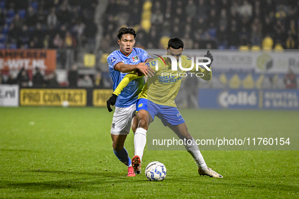 NEC forward Kento Shiogai and RKC midfielder Yassin Oukili play during the match between RKC and NEC at the Mandemakers Stadium in Waalwijk,...