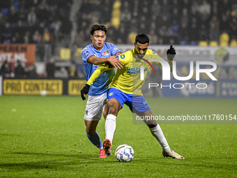 NEC forward Kento Shiogai and RKC midfielder Yassin Oukili play during the match between RKC and NEC at the Mandemakers Stadium in Waalwijk,...