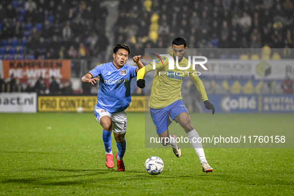 NEC forward Kento Shiogai and RKC midfielder Yassin Oukili play during the match between RKC and NEC at the Mandemakers Stadium in Waalwijk,...