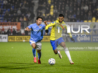 NEC forward Kento Shiogai and RKC midfielder Yassin Oukili play during the match between RKC and NEC at the Mandemakers Stadium in Waalwijk,...