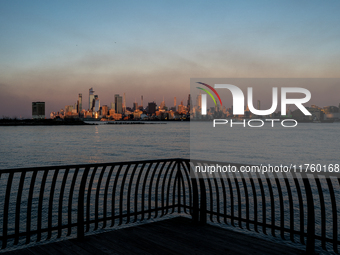 Smoke from New Jersey brush fires fills the sky in New York, U.S., on November 9, 2024. There are at least four active brush fires in New Je...