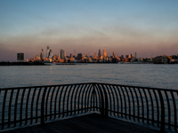 Smoke from New Jersey brush fires fills the sky in New York, U.S., on November 9, 2024. There are at least four active brush fires in New Je...