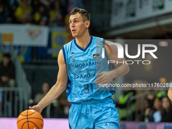 Players are in action during the Liga Endesa 2024-2025 match between Morabanc Andorra and UCAM Murcia at Poliesportiu d'Andorra in Andorra L...