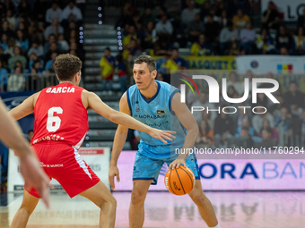 Players are in action during the Liga Endesa 2024-2025 match between Morabanc Andorra and UCAM Murcia at Poliesportiu d'Andorra in Andorra L...