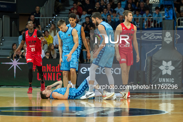 Players are in action during the Liga Endesa 2024-2025 match between Morabanc Andorra and UCAM Murcia at Poliesportiu d'Andorra in Andorra L...