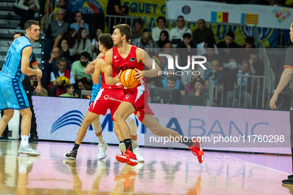 Players are in action during the Liga Endesa 2024-2025 match between Morabanc Andorra and UCAM Murcia at Poliesportiu d'Andorra in Andorra L...