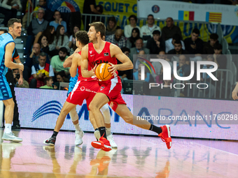 Players are in action during the Liga Endesa 2024-2025 match between Morabanc Andorra and UCAM Murcia at Poliesportiu d'Andorra in Andorra L...