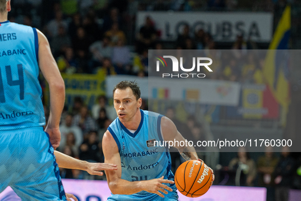 Players are in action during the Liga Endesa 2024-2025 match between Morabanc Andorra and UCAM Murcia at Poliesportiu d'Andorra in Andorra L...