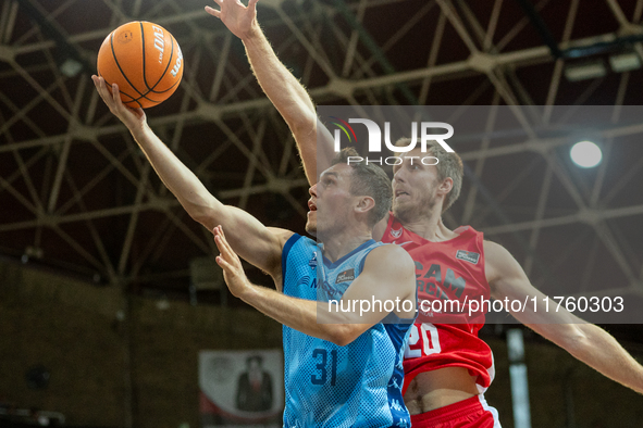 Players are in action during the Liga Endesa 2024-2025 match between Morabanc Andorra and UCAM Murcia at Poliesportiu d'Andorra in Andorra L...