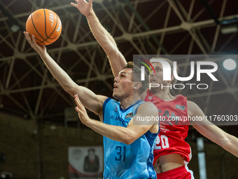 Players are in action during the Liga Endesa 2024-2025 match between Morabanc Andorra and UCAM Murcia at Poliesportiu d'Andorra in Andorra L...