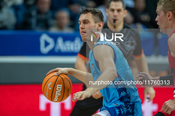 Players are in action during the Liga Endesa 2024-2025 match between Morabanc Andorra and UCAM Murcia at Poliesportiu d'Andorra in Andorra L...