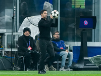 Mikel Arteta Head Coach of Arsenal gestures during the UEFA Champions League 2024/25 League Phase MD4 match between FC Internazionale and Ar...