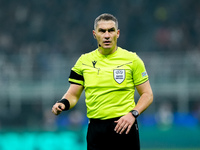 Referee Istvan Kovacs looks on during the UEFA Champions League 2024/25 League Phase MD4 match between FC Internazionale and Arsenal at Stad...