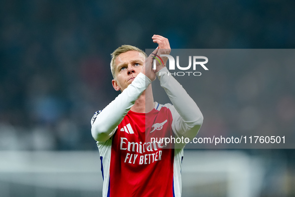 Oleksandr Zinchenko of Arsenal greets the fans during the UEFA Champions League 2024/25 League Phase MD4 match between FC Internazionale and...