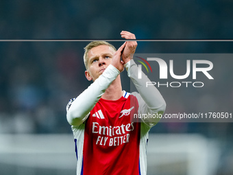 Oleksandr Zinchenko of Arsenal greets the fans during the UEFA Champions League 2024/25 League Phase MD4 match between FC Internazionale and...