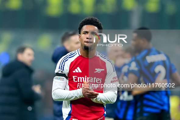 Ethan Nwaneri of Arsenal greets the supporters during the UEFA Champions League 2024/25 League Phase MD4 match between FC Internazionale and...