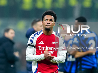 Ethan Nwaneri of Arsenal greets the supporters during the UEFA Champions League 2024/25 League Phase MD4 match between FC Internazionale and...