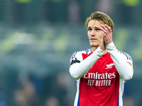 Martin Odegaard of Arsenal greets the fans during the UEFA Champions League 2024/25 League Phase MD4 match between FC Internazionale and Ars...