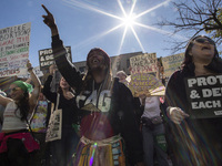 Abortion rights activists gather in front of the Heritage Foundation building during the Women's March in Washington DC, on November 9, 2024...