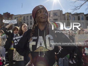 Abortion rights activists gather in front of the Heritage Foundation building during the Women's March in Washington DC, on November 9, 2024...