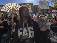 Abortion rights activists gather in front of the Heritage Foundation building during the Women's March in Washington DC, on November 9, 2024...