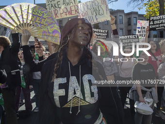 Abortion rights activists gather in front of the Heritage Foundation building during the Women's March in Washington DC, on November 9, 2024...