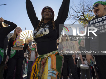 Abortion rights activists gather in front of the Heritage Foundation building during the Women's March in Washington DC, on November 9, 2024...