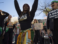 Abortion rights activists gather in front of the Heritage Foundation building during the Women's March in Washington DC, on November 9, 2024...