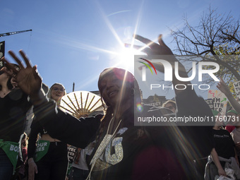 Abortion rights activists gather in front of the Heritage Foundation building during the Women's March in Washington DC, on November 9, 2024...