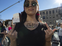 Abortion rights activists gather in front of the Heritage Foundation building during the Women's March in Washington DC, on November 9, 2024...