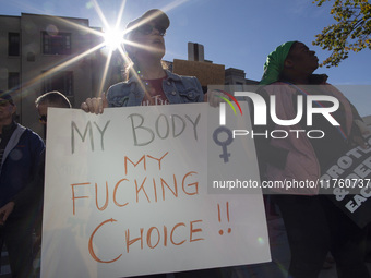 Abortion rights activists gather in front of the Heritage Foundation building during the Women's March in Washington DC, on November 9, 2024...