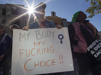 Abortion rights activists gather in front of the Heritage Foundation building during the Women's March in Washington DC, on November 9, 2024...