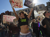 Abortion rights activists gather in front of the Heritage Foundation building during the Women's March in Washington DC, on November 9, 2024...