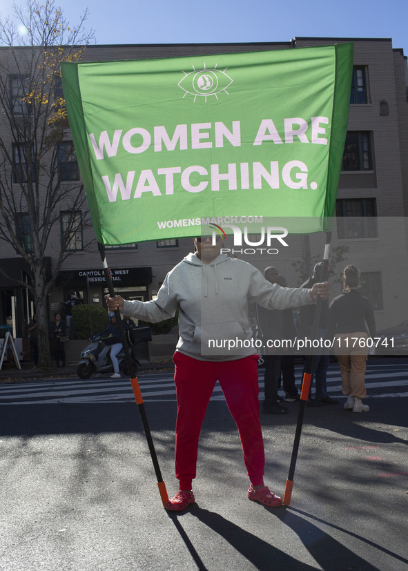 Abortion rights activists gather in front of the Heritage Foundation building during the Women's March in Washington DC, on November 9, 2024...