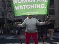 Abortion rights activists gather in front of the Heritage Foundation building during the Women's March in Washington DC, on November 9, 2024...