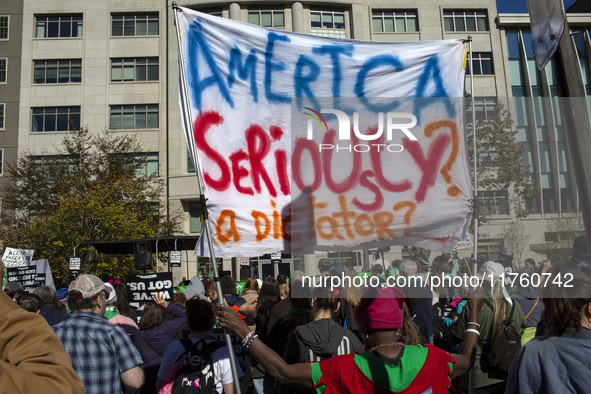 Abortion rights activists gather in front of the Heritage Foundation building during the Women's March in Washington DC, on November 9, 2024...