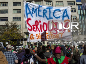 Abortion rights activists gather in front of the Heritage Foundation building during the Women's March in Washington DC, on November 9, 2024...