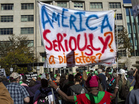 Abortion rights activists gather in front of the Heritage Foundation building during the Women's March in Washington DC, on November 9, 2024...