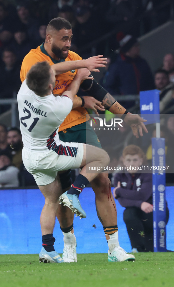 Australia's Lukhan Salakaia-Loto (Randwick) and England's Harry Randall (Bristol Bears) participate in the Autumn Nations Series between Eng...