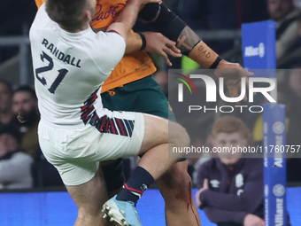 Australia's Lukhan Salakaia-Loto (Randwick) and England's Harry Randall (Bristol Bears) participate in the Autumn Nations Series between Eng...