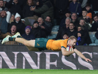 Australia's Max Jorgensen (Balmain Wolves) scores the winning try during the Autumn Nations Series between England and Australia (Wallabies)...